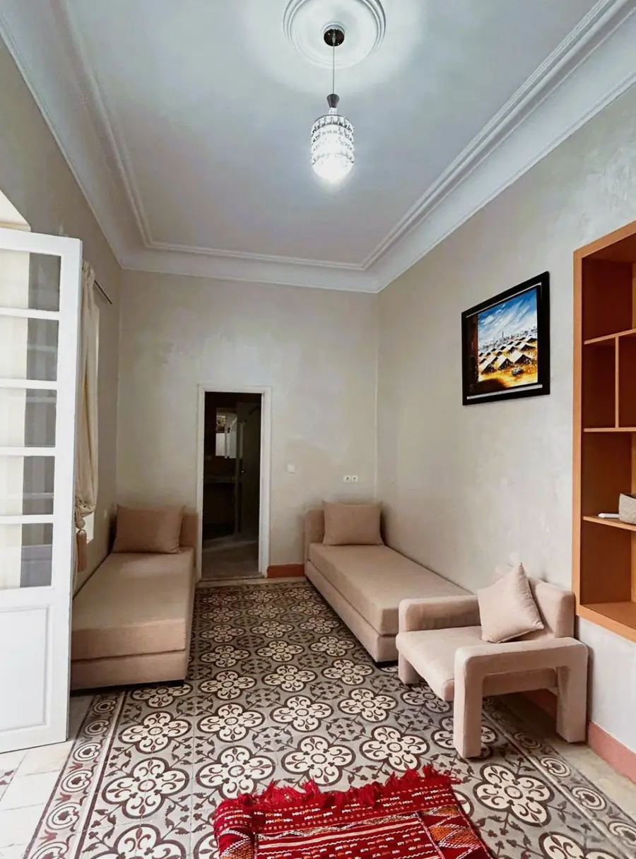 Le coin salon de la grande chambre familiale