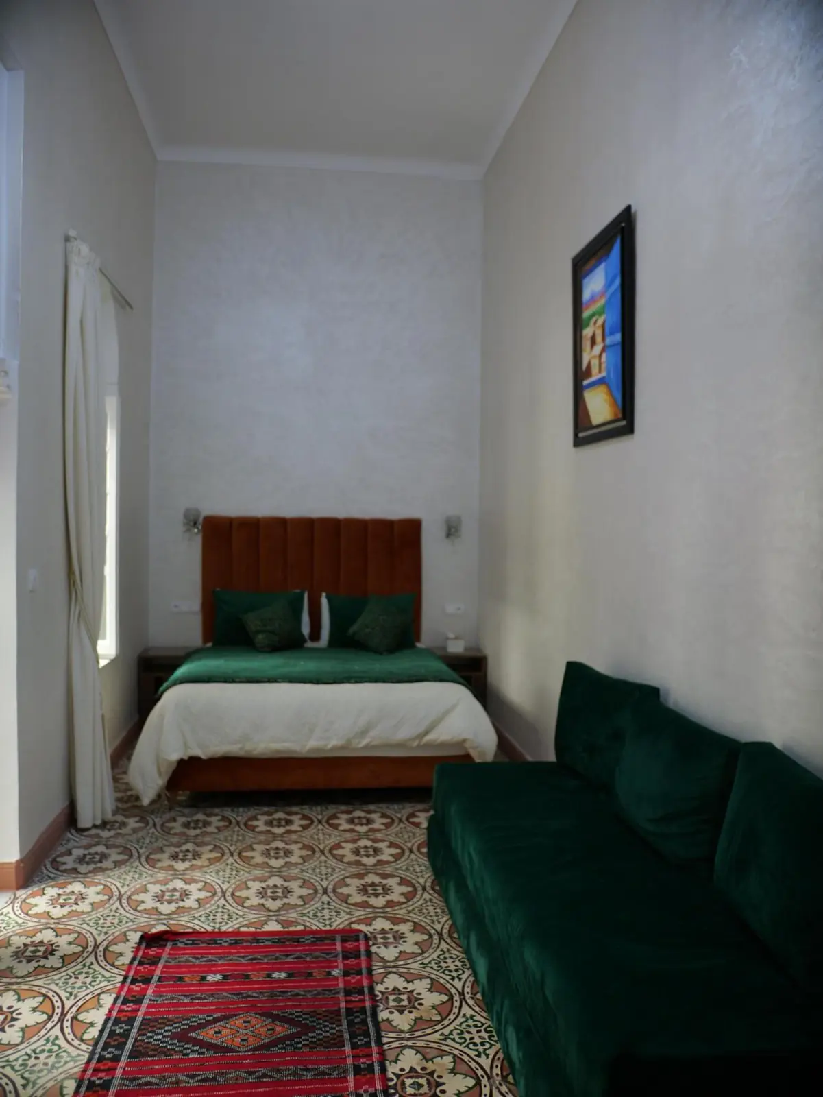Double Deluxe avec canapé-lit, le lit et le canapé